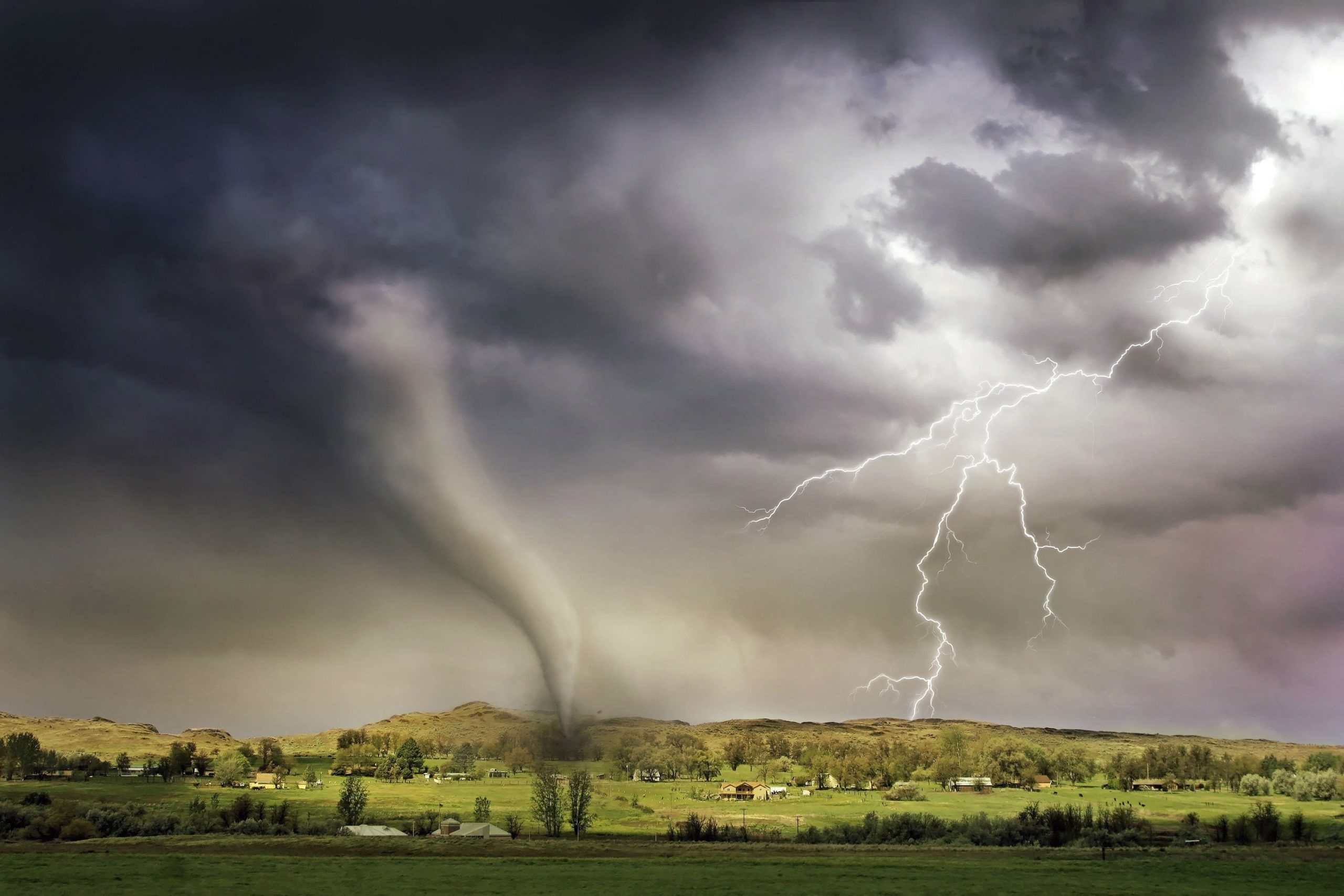 A tornado system tearing through the sky A tornado system tearing through the sky