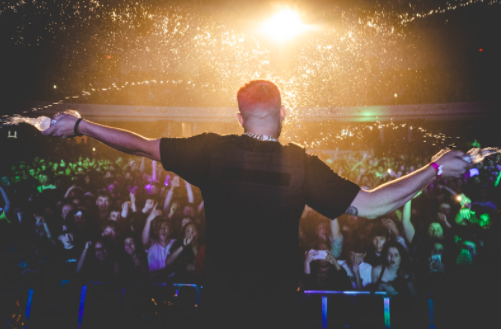 From Warehouses to Arenas: How Dommy Divine Scaled Up His Business by Creating His Own World