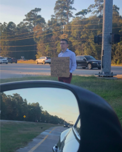 23-Year-Old Texas Realtor Holds “Starving For Success” Cardboard Sign, Hands Out Business Cards