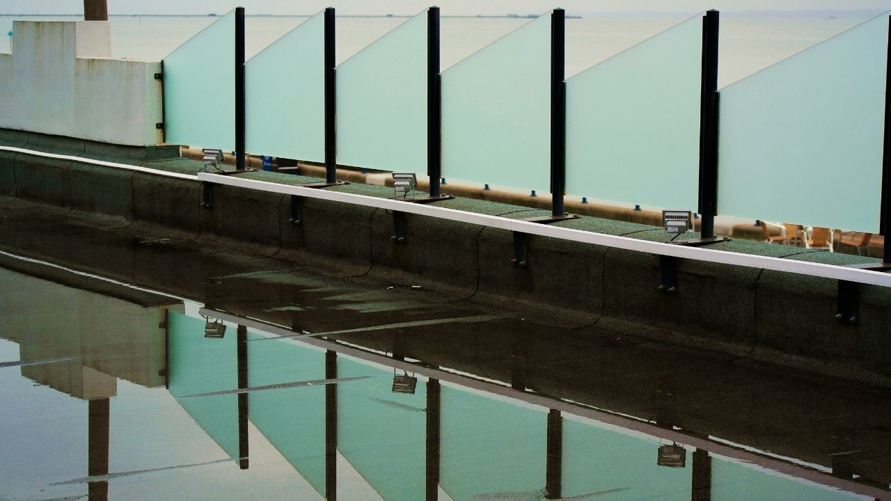How To Stop Water Pooling on a Flat Roof?